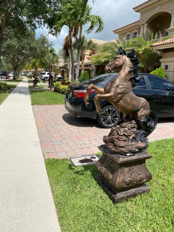 Traditional Garden Horse Statue with Weathered Stone Finish on Pedestal