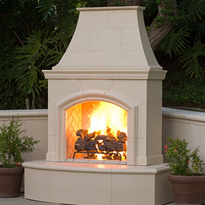 Traditional Outdoor Fireplace featuring Arched Opening and Mantle