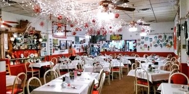 Traditional Restaurant Interior Design Perimeter Booth Seating Warm Wood