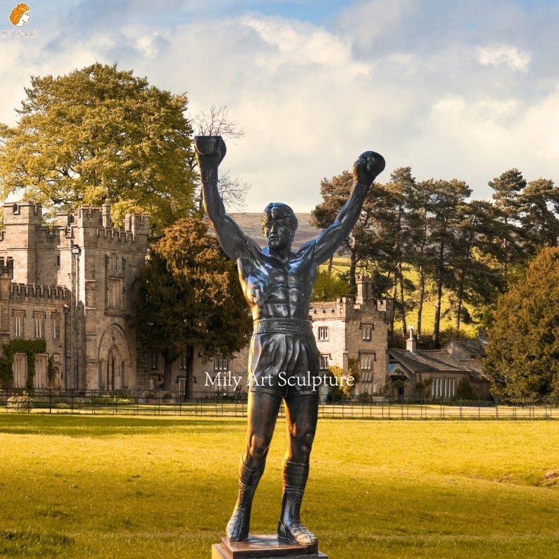 Triumphant Boxer Garden Statue with Raised Arms