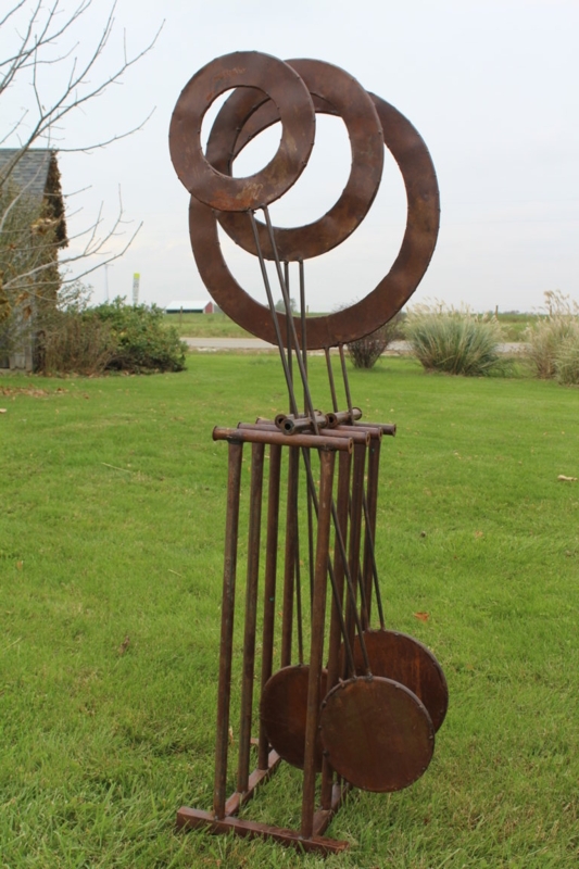 Weathered Metal Garden Sculpture Kinetic Pendulum Design