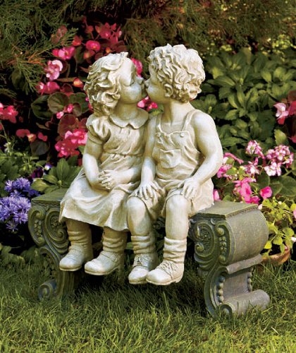 Weathered Stone Garden Statue of Smooching Children on Bench