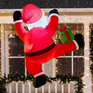 Whimsical Christmas Inflatable Santa in Climbing Pose with LEDs
