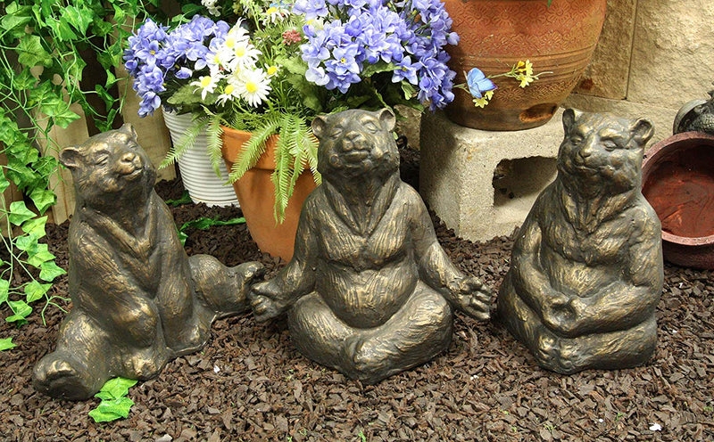Whimsical Figurine Set with yoga bear poses and rust metal finish.
