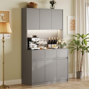 White Kitchen Pantry with Outlets and Decorative X-Mullion Doors