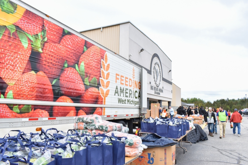 White Mobile Pantry Truck with Branding for Community Food Distribution