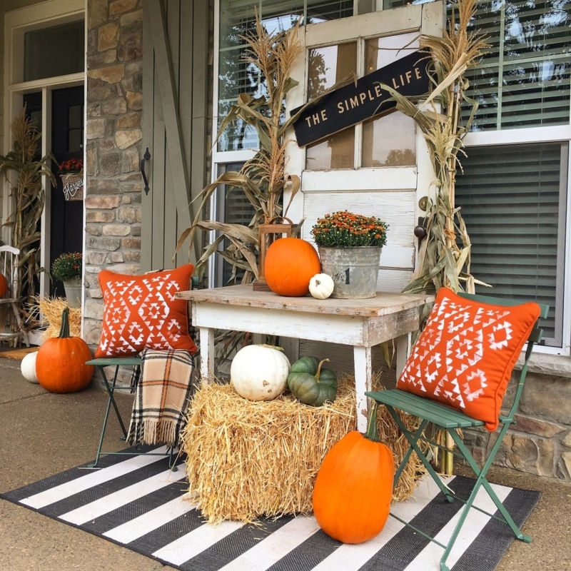 White Rocking Chair on White Farmhouse Porch with Rustic Style