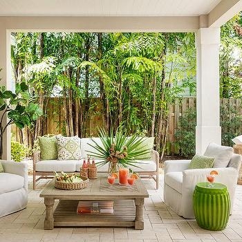 Wood Frame Outdoor Sectional Sofa with Green Accents and Slatted Back