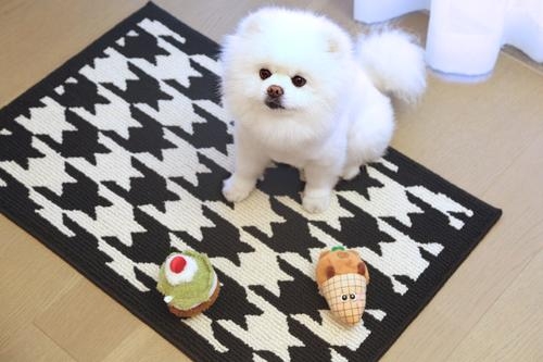 Area Rug: Oversized Houndstooth Pattern, Monochrome Contrast, Washable.
