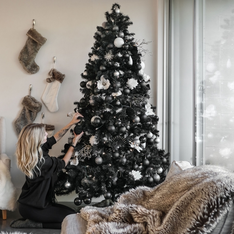 Black Christmas Tree Metallic Star Accents High Contrast Festive