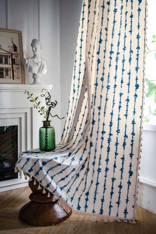 Blue Vertical Stripe Balloon Shades Layered With Sheer Drapes