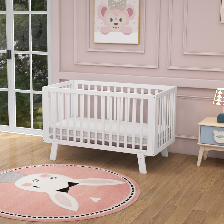 Classic Baby Crib White with Arched End Panels and Vertical Slats