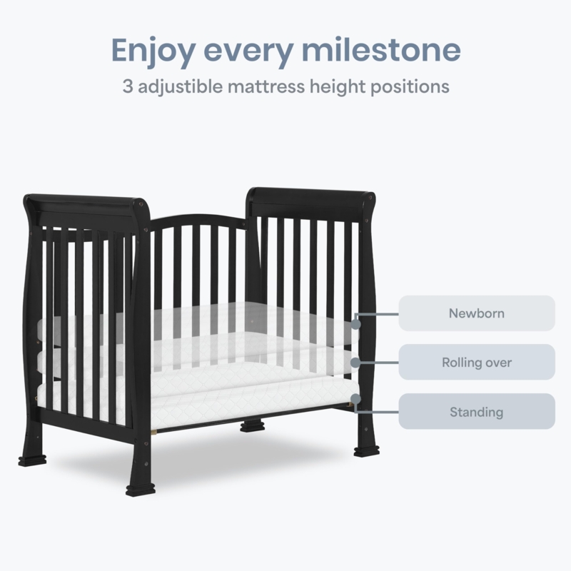 Compact Black Mini Crib with Arched Rails, Classic Nursery Style
