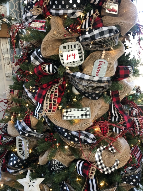 Decorated Christmas Tree: Buffalo Check Ribbon Garland and Basket Tree Collar.
