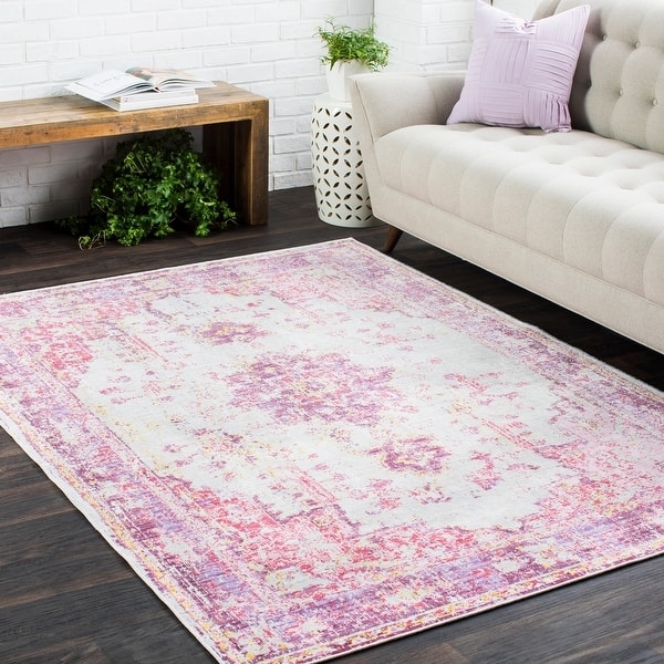 Distressed Pink Oriental Area Rug with Fringe Detail