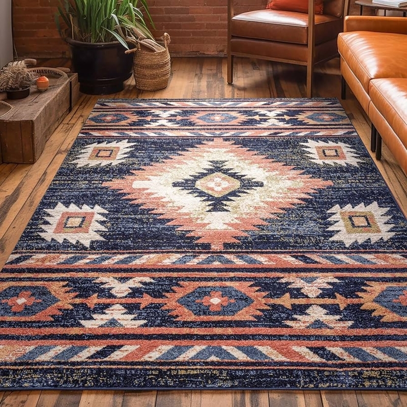 Distressed Tribal Area Rug featuring Navy and Rust Geometric Border