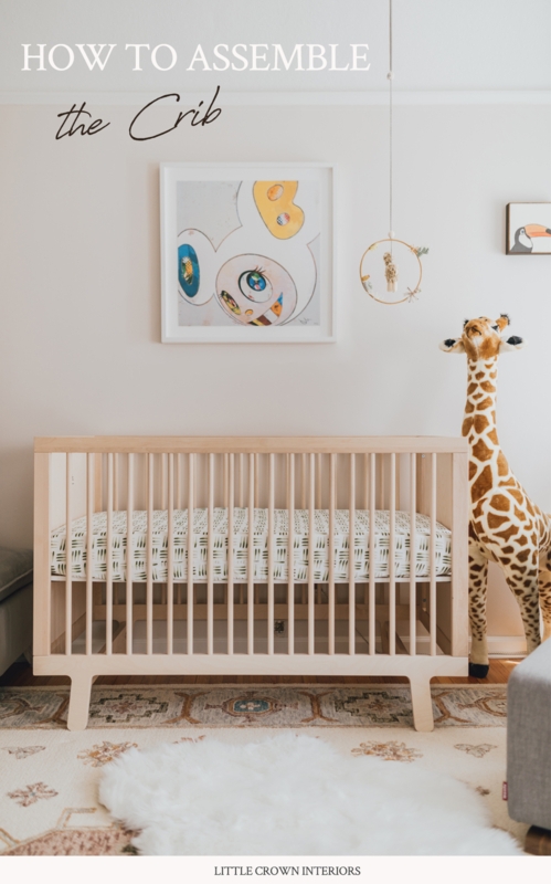 Elegant Nursery Wainscoting Design with Classic White Slatted Crib