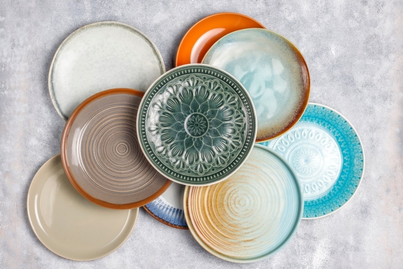 Glossy Ceramic Dinnerware Set, Nested Bowls and Vibrant Plates.