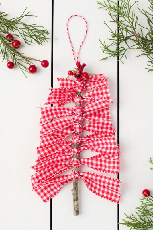 Handcrafted Christmas Ornaments: Fabric Wrapped Balls with Jute Twine Bows.