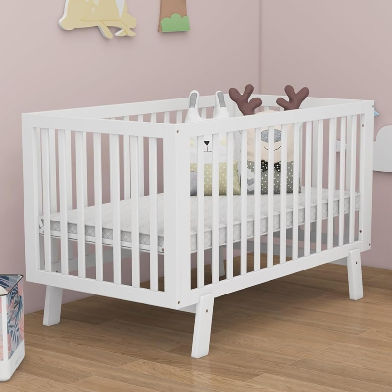 Minimalist Baby Crib featuring All-White Slatted Design for Nurseries