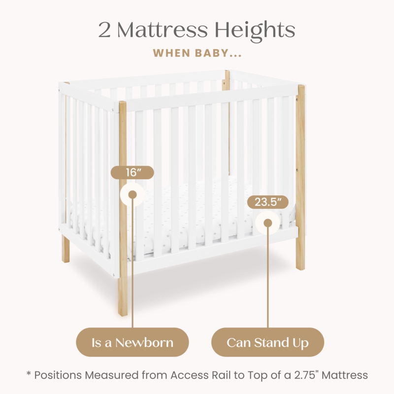 Modern Mini Crib White with Wood Legs and Adjustable Base