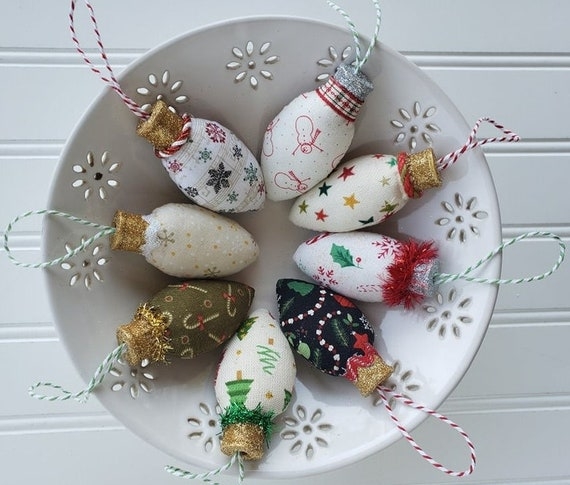 Primitive Tea-Stained Fabric Ornaments with Rusted Metal Caps