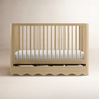 Scandinavian White Spindle Crib featuring Tapered Wood Legs