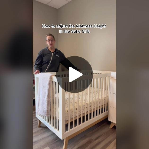 Slatted Baby Crib in Matte White with Visible Adjustment Slots