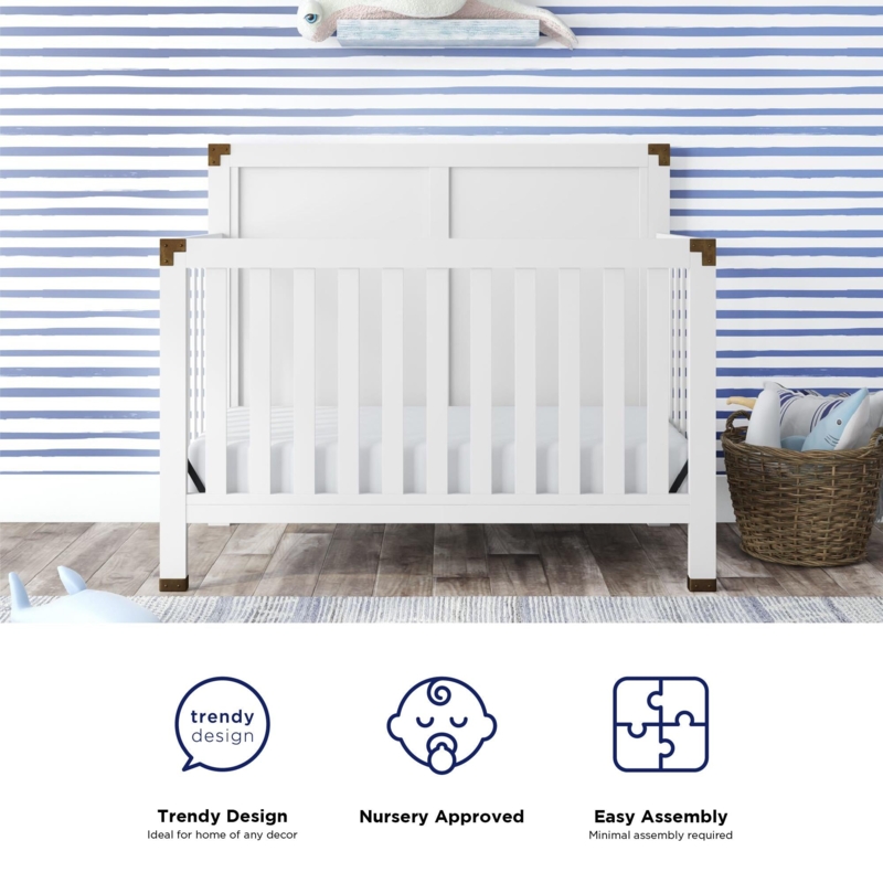 Sophisticated Navy and White Nursery Design with Modern Crib