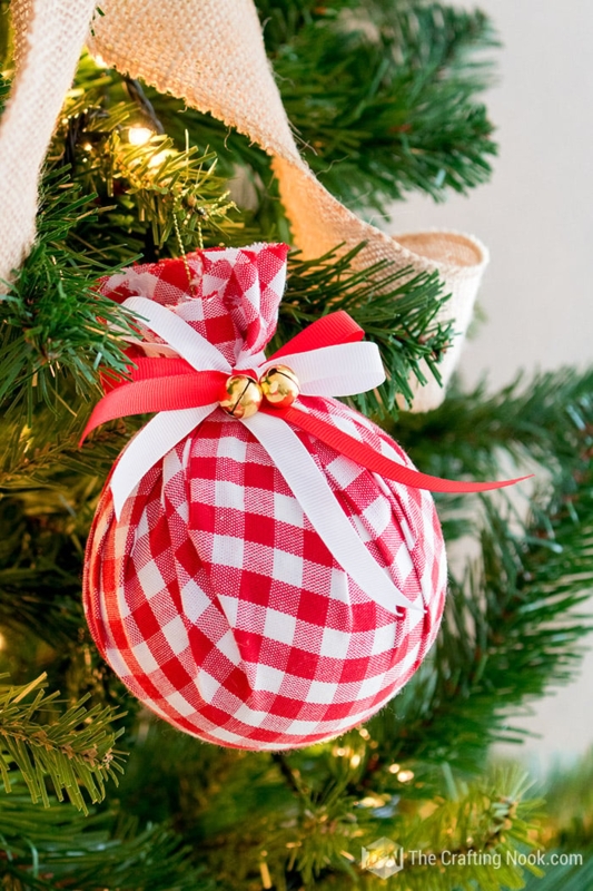 Spherical Christmas Bauble: Fabric-Like Surface featuring a Metallic Gold Cap.