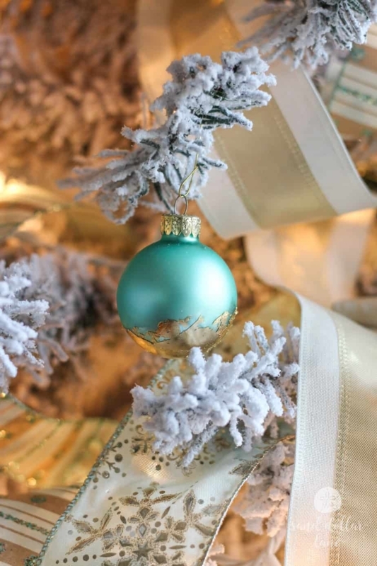 White Artificial Christmas Tree with Starfish Decor and Beaded Garland
