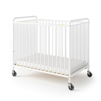 White Crib with Solid End Panels and Subtle Arched Top Rail
