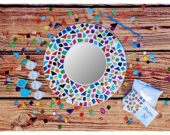 Accent Mirror: Blue Gradient Concentric Rows, Iridescent Teal Glass Wall.