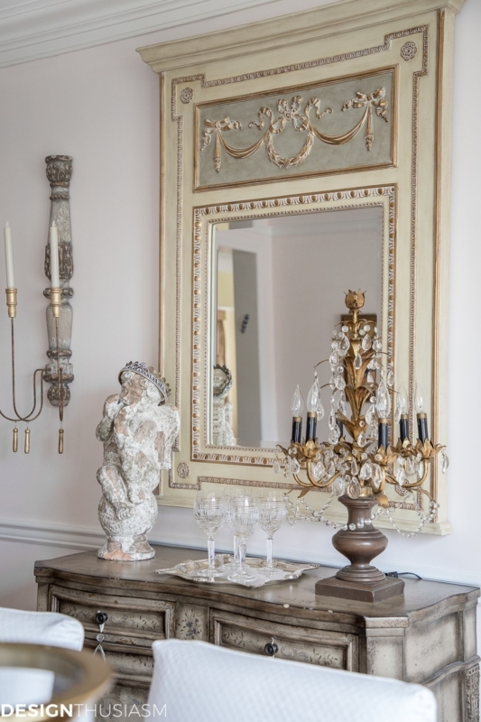 Accent Mirror: Ornate Frame over White Sideboard Pairing