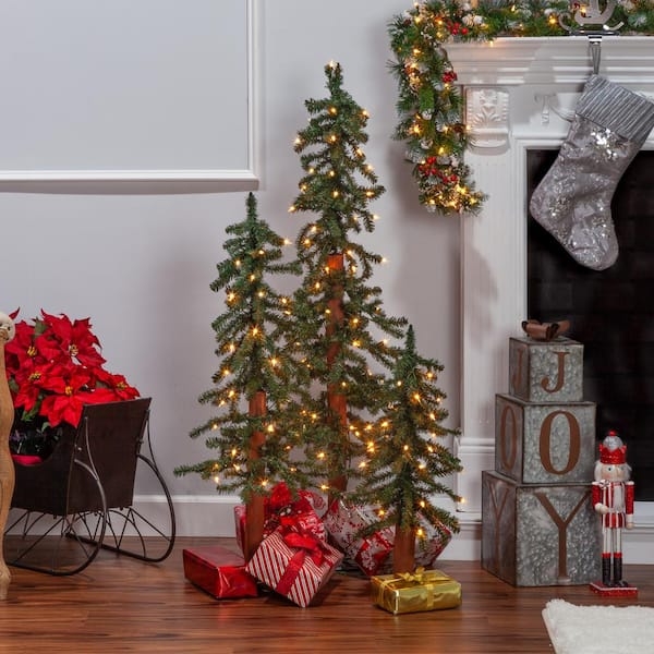 Alpine Christmas Tree Set: Pre-Lit Sparse Branches on Square Bases.