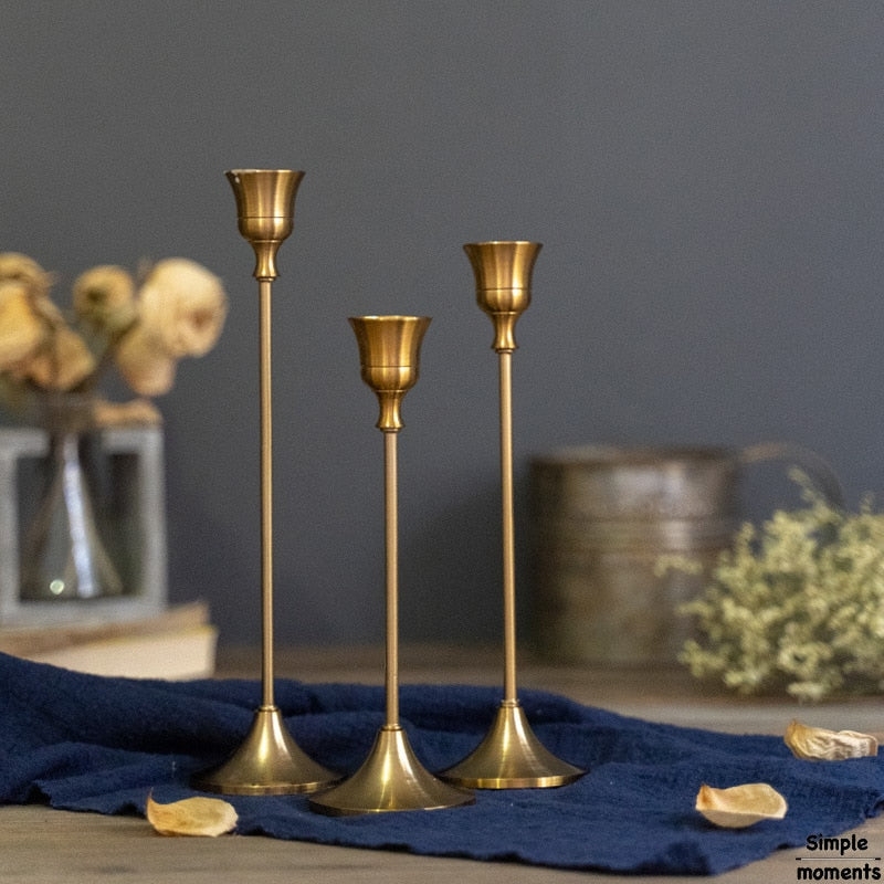 Antique Bronze Taper Candle Holders with Staggered Heights and Slim Stems