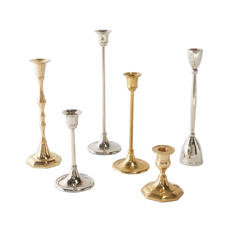 Antique Gold Candlestick Trio with Fluted Stems and Staggered Heights