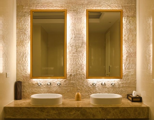 Backlit Mirror Circular Frameless against White Subway Tile