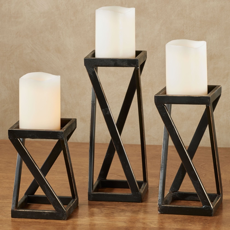 Candle Holder Set with Curved Intersecting Stems for Architectural Decor.
