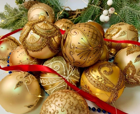 Christmas Ornament Set: Handcrafted glass, jeweled accents, glitter scrolls.