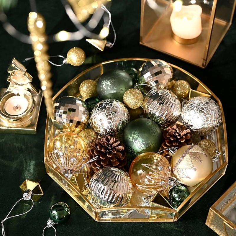 Christmas Tree Ornaments: Emerald green palette and gold assorted shapes.