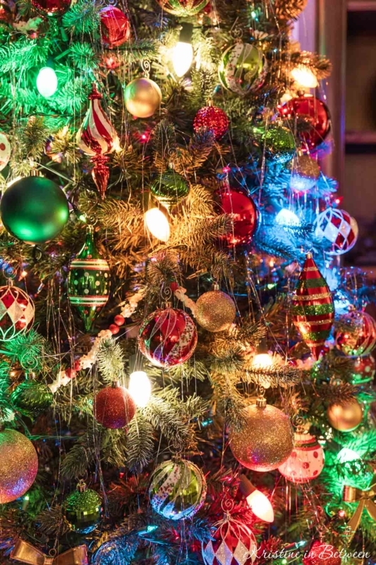 Christmas Tree with Vertical Ribbon Garland and Red White Ornaments