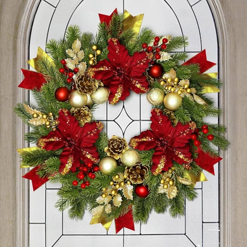Christmas Wreath with Poinsettias and Frosted Cedar Leaves
