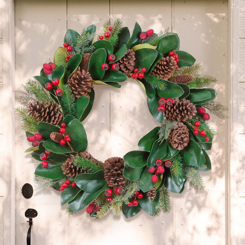 Classic Winter Door Wreath Design with Magnolia Leaves and Pinecones