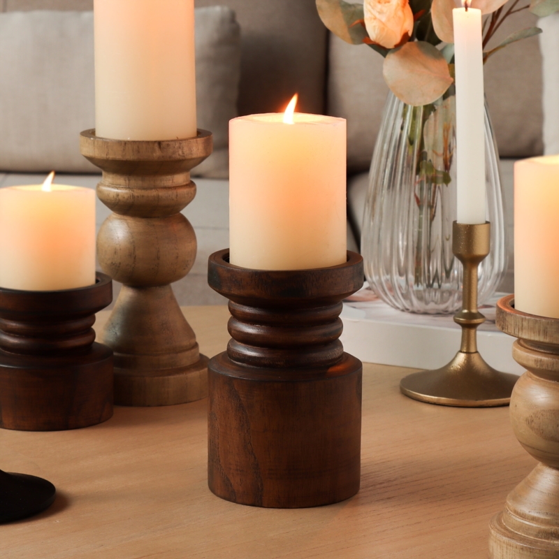 Dark Brown Pillar Candle Holder with Turned Pedestal for Traditional Decor.