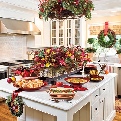 Dark Wood Buffet with Symmetrical Styling and Wreath on Mirror