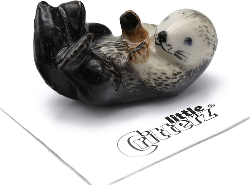 Decorative Figurine Glossy Hand Painted Porcelain Sea Otter Floating Pose