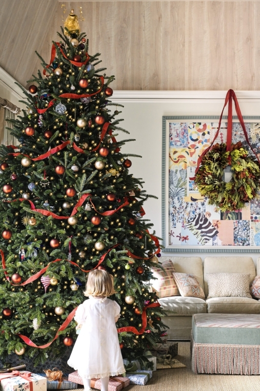 Elegant Christmas Tree with Large Metallic Ornaments and Tree Basket
