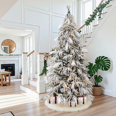 Elegant White Flocked Tree Lighting on a Slender Pre-Lit Profile