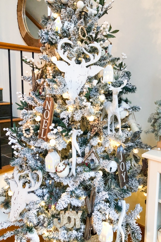 Flocked Christmas Tree with Wood Bead Garland and Basket Collar Decor